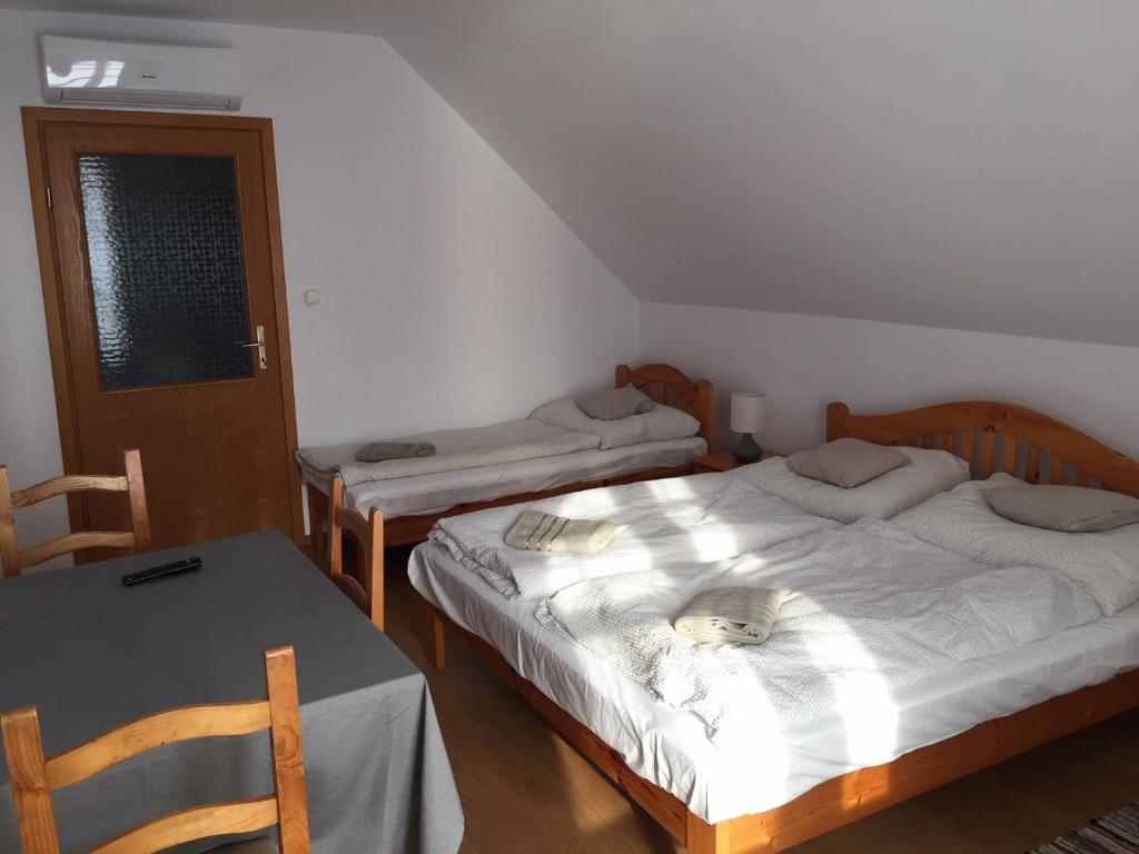 Postel nebo postele na pokoji v ubytování Villa Elysium