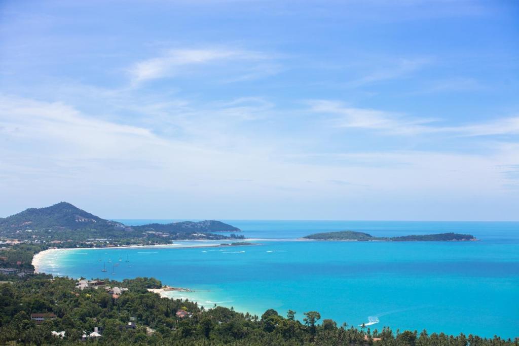 a view of the ocean with islands in the distance at Samui Sea Star Villa in Bophut 