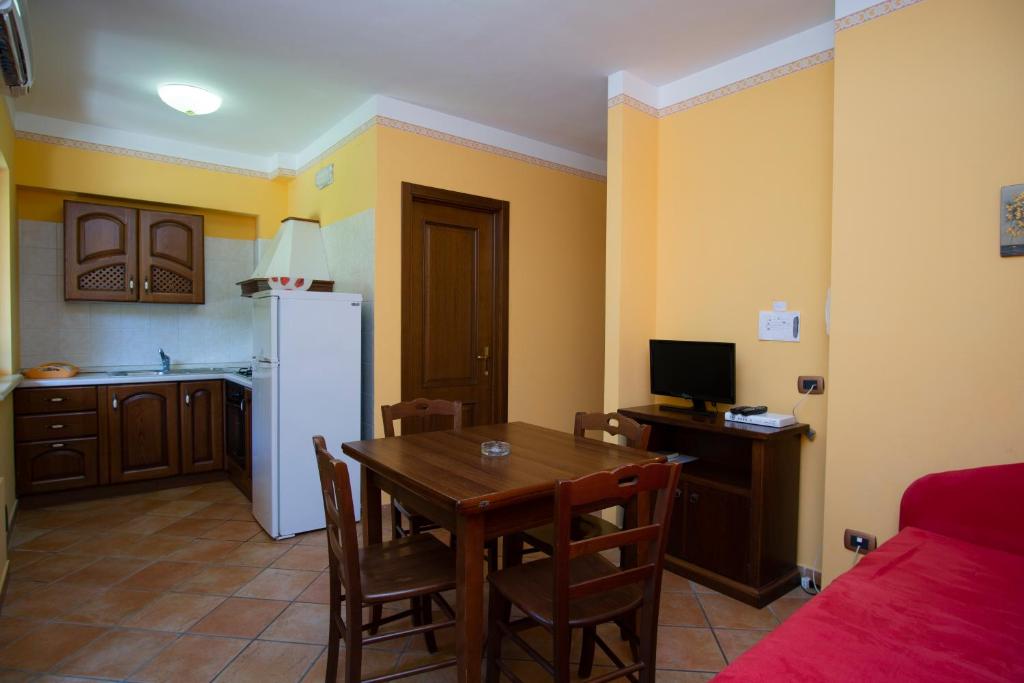 Кухня или мини-кухня в Residence Baia Infreschi
