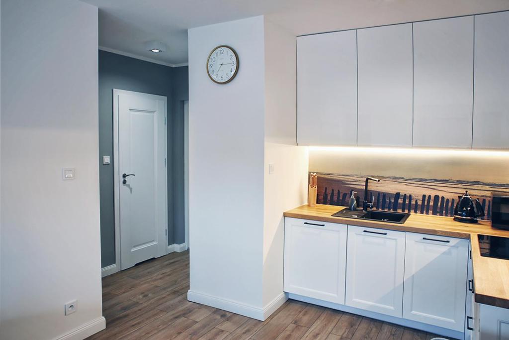 Kuchyňa alebo kuchynka v ubytovaní Apartamenty Silva Hel
