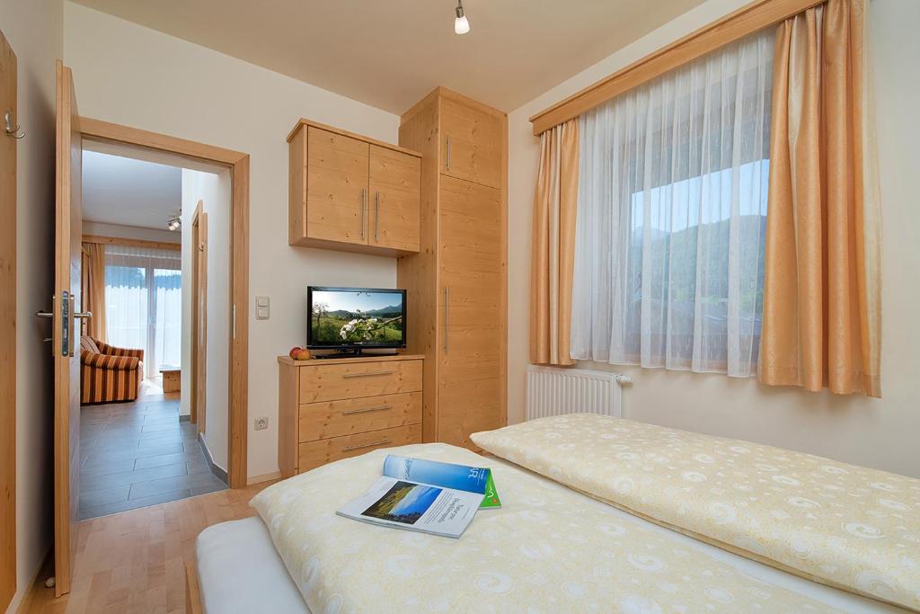 Postel nebo postele na pokoji v ubytování Hubertushof