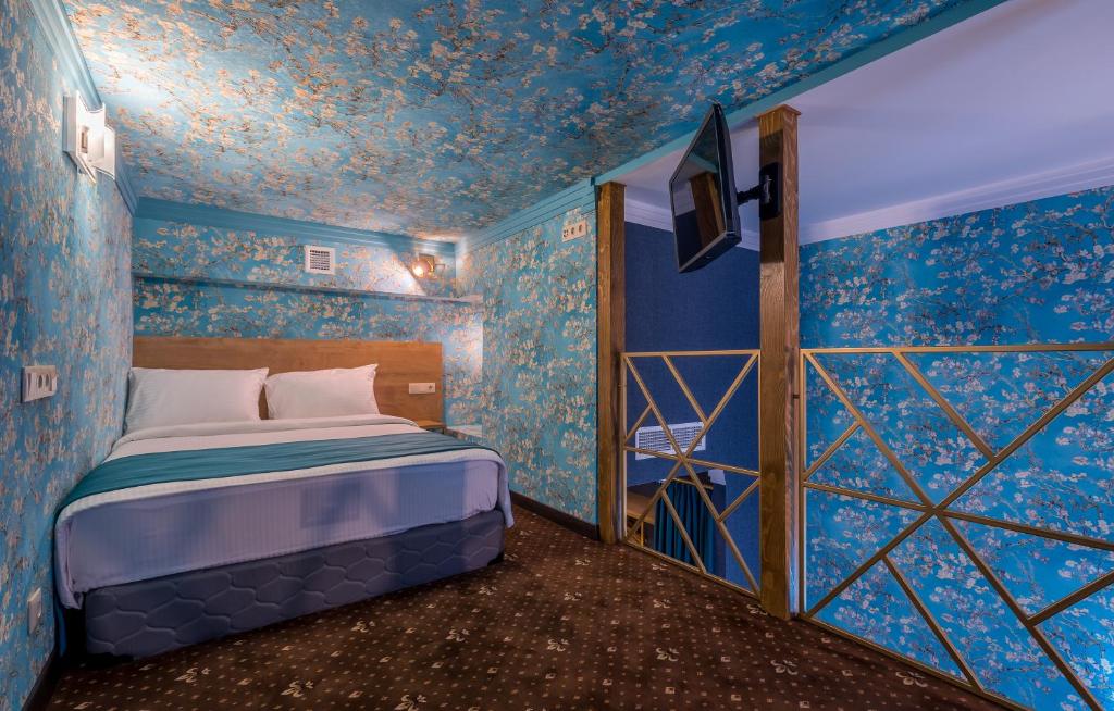 Postel nebo postele na pokoji v ubytování Gladius Inn Boutique Hotel by DNT Group