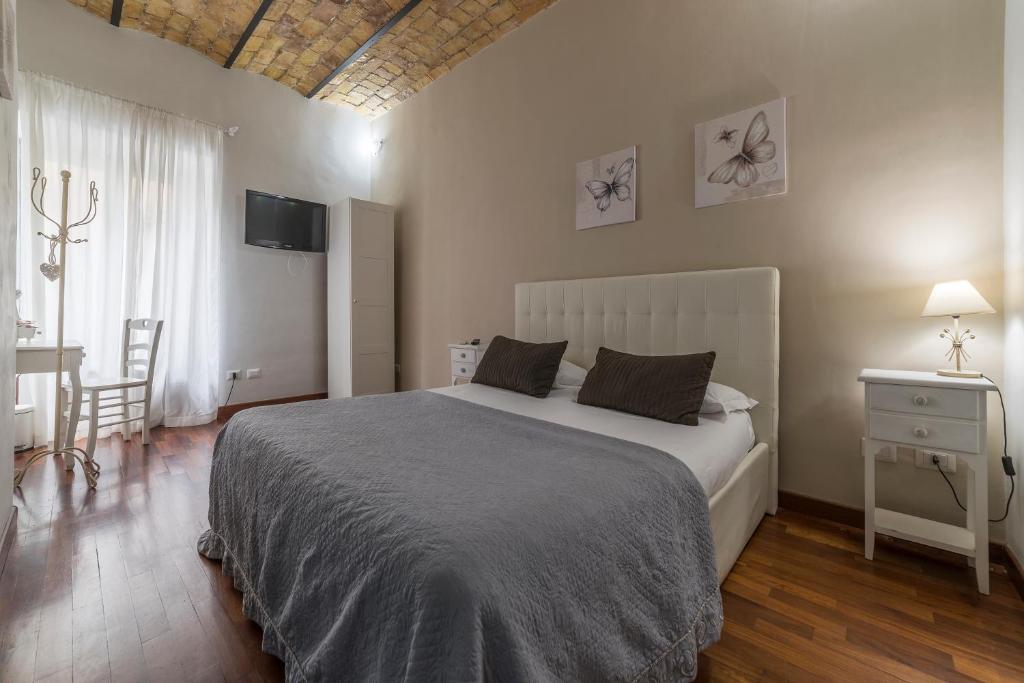 En eller flere senge i et værelse på Residenza Sistina