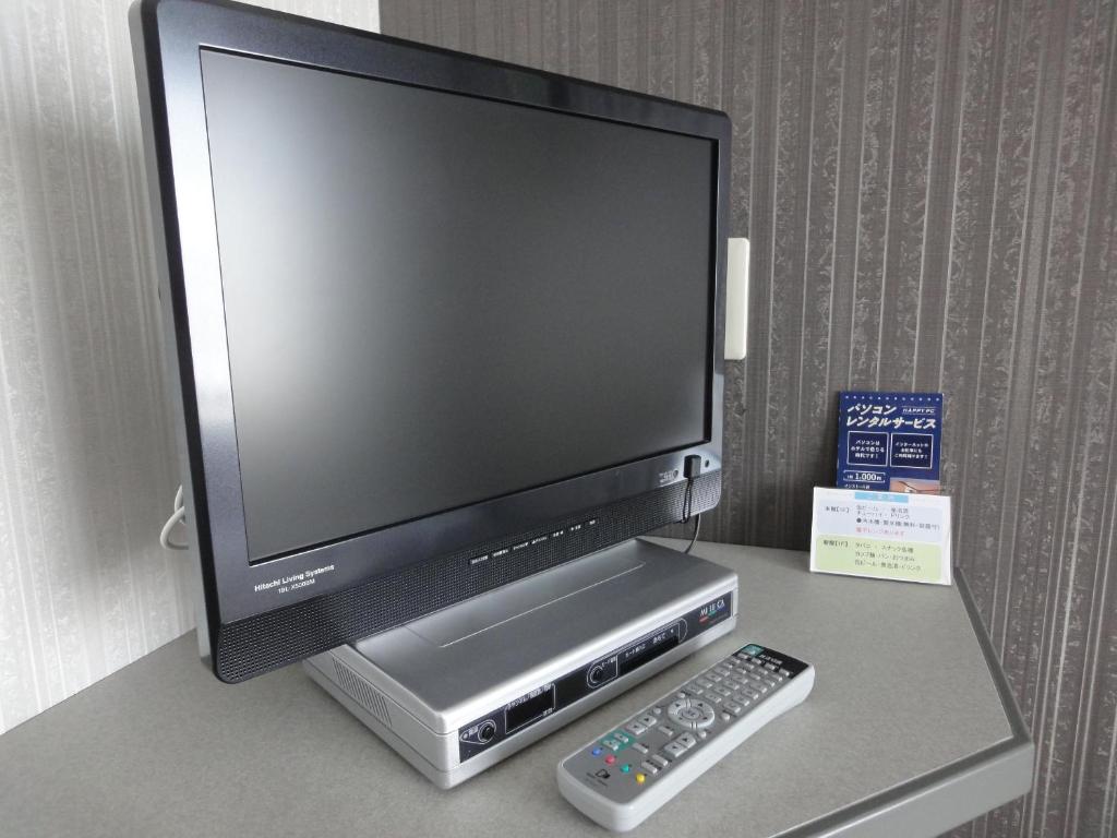 TV a/nebo společenská místnost v ubytování Tottori City Hotel