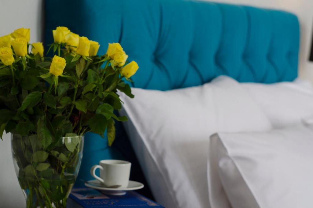 Ein Bett oder Betten in einem Zimmer der Unterkunft Serendipity