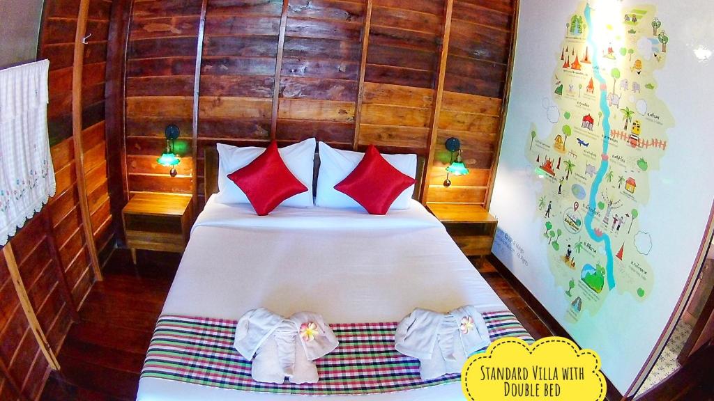 Postel nebo postele na pokoji v ubytování Mango House