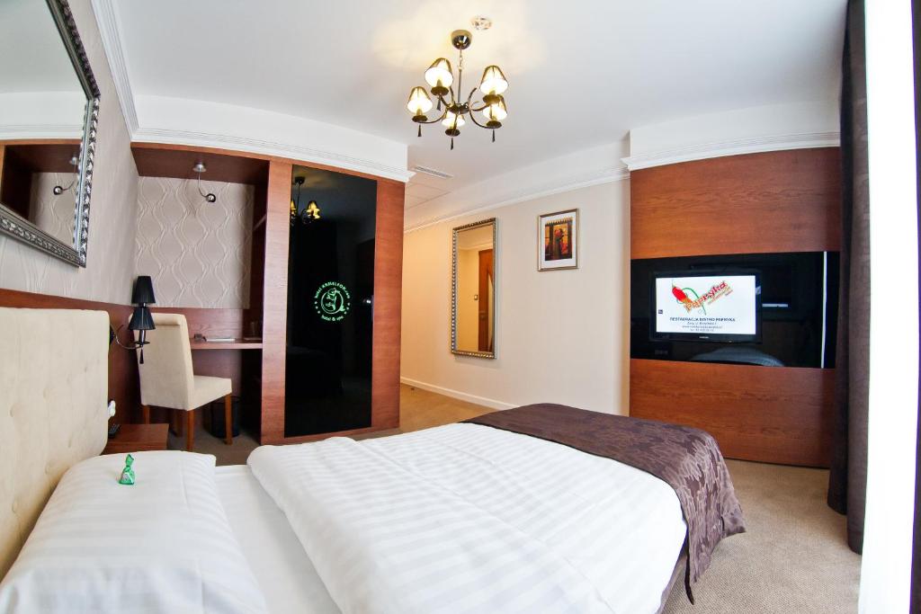Postel nebo postele na pokoji v ubytování Hotel&Spa Kameleon