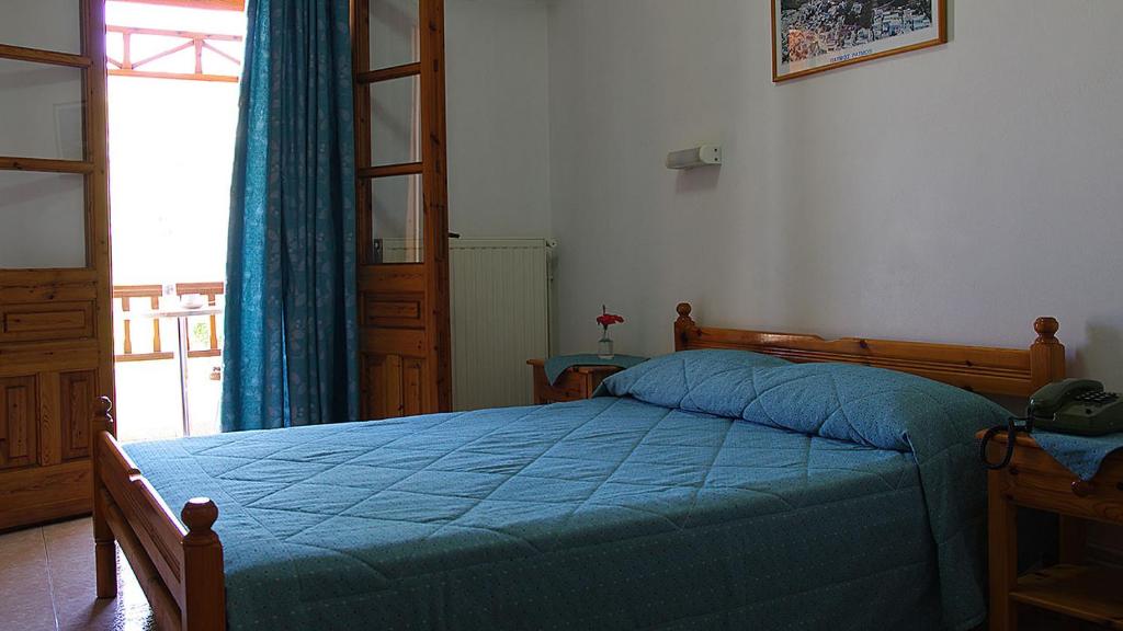 Postel nebo postele na pokoji v ubytování Effie Hotel
