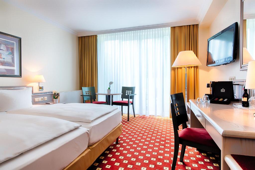 TV a/nebo společenská místnost v ubytování Welcome Hotel Bad Arolsen