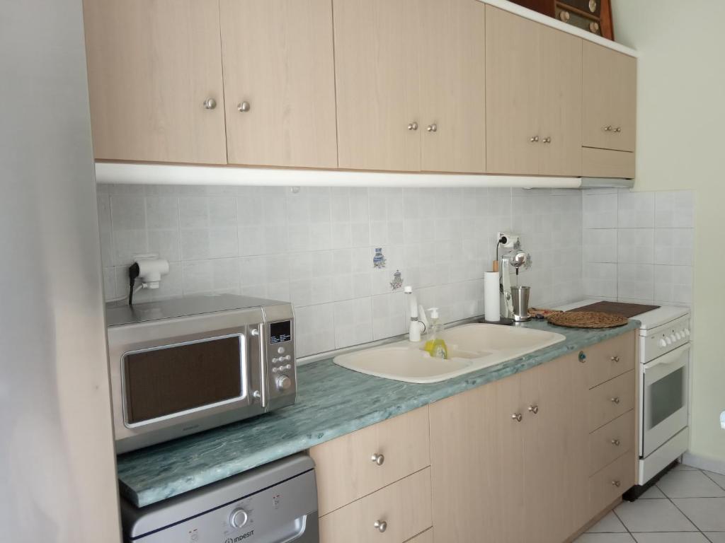 Kuchyň nebo kuchyňský kout v ubytování Filippos House