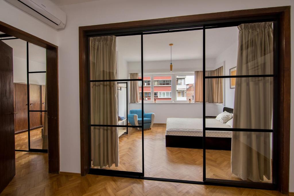 Postel nebo postele na pokoji v ubytování Design Apartment in Sofia top city center