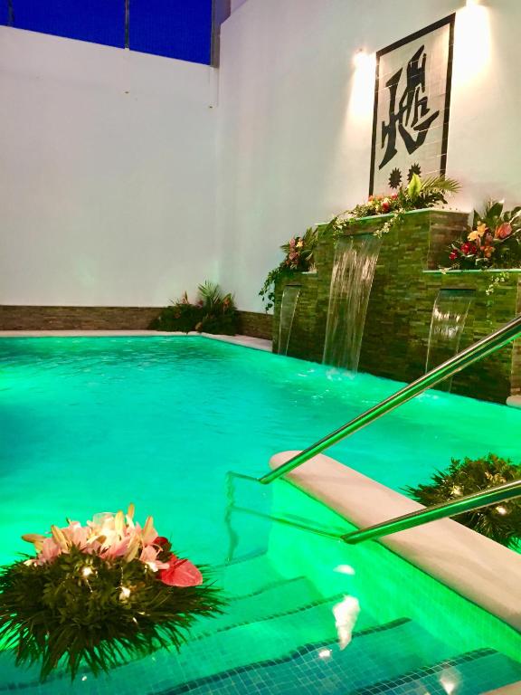 Bazén v ubytování Hotel Chipiona nebo v jeho okolí