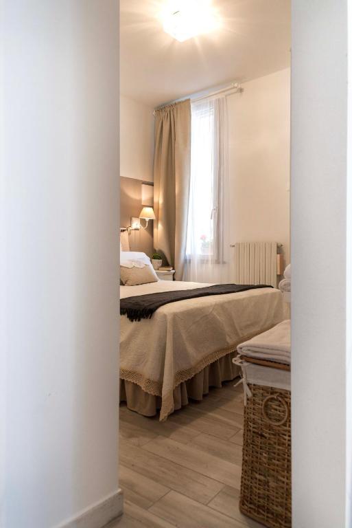Posteľ alebo postele v izbe v ubytovaní Tosca's House