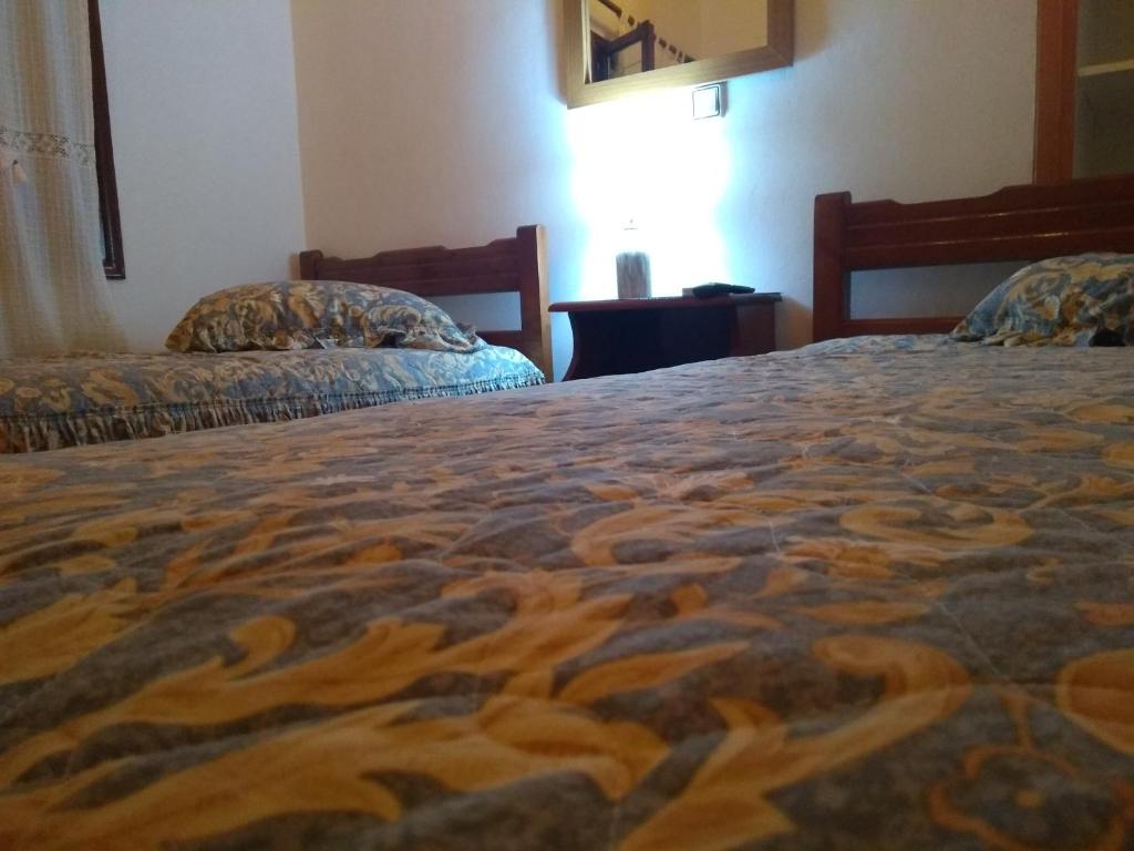 Postel nebo postele na pokoji v ubytování Dameli