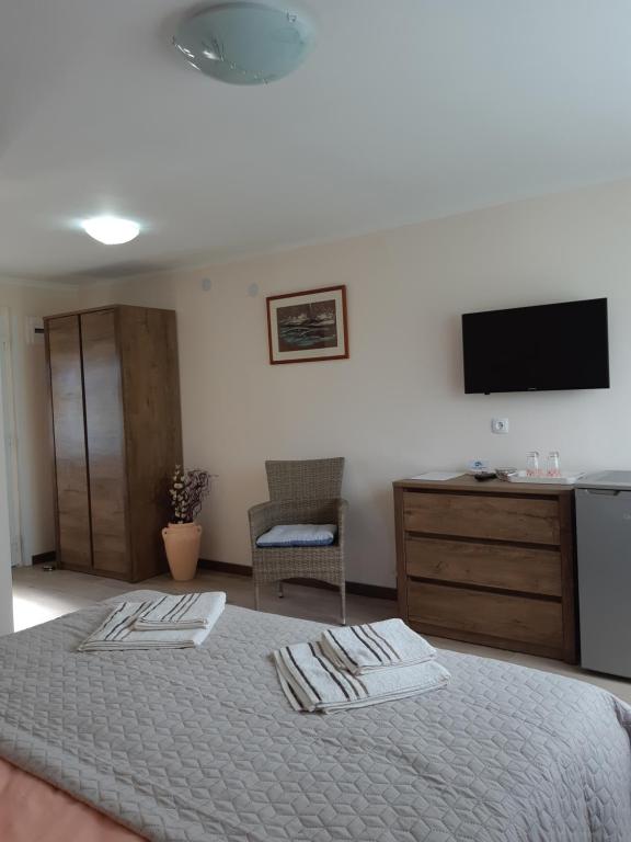 Postel nebo postele na pokoji v ubytování Apartments Kozjan