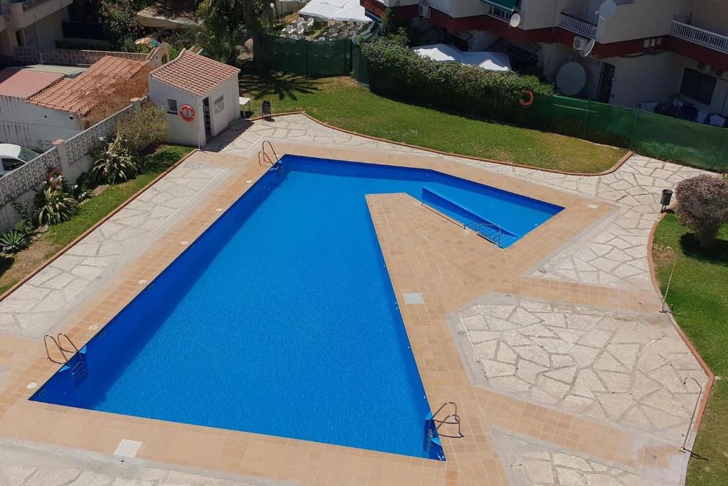 Bazén v ubytování Neptuno Torrecilla Beach nebo v jeho okolí