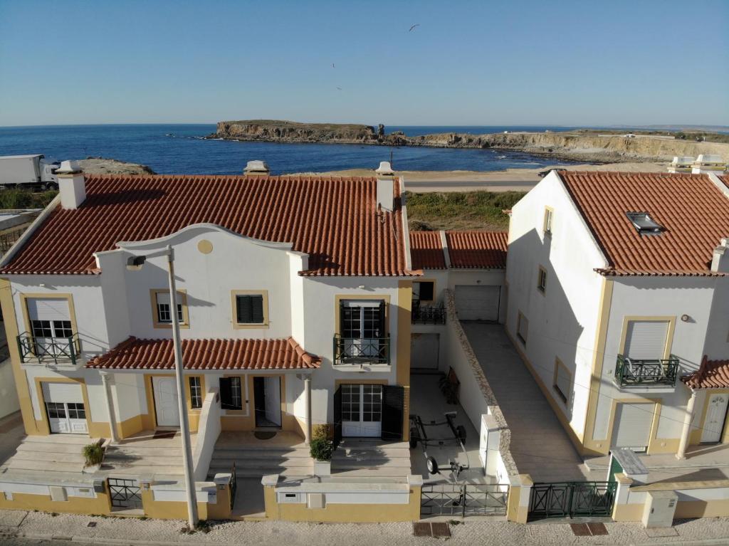 a house with a view of the ocean at Papôa Beach House in Peniche