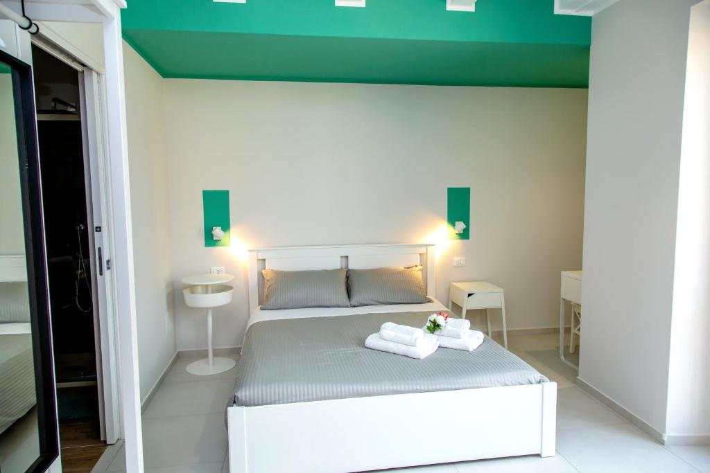 Postel nebo postele na pokoji v ubytování Guest House Nonnolorè