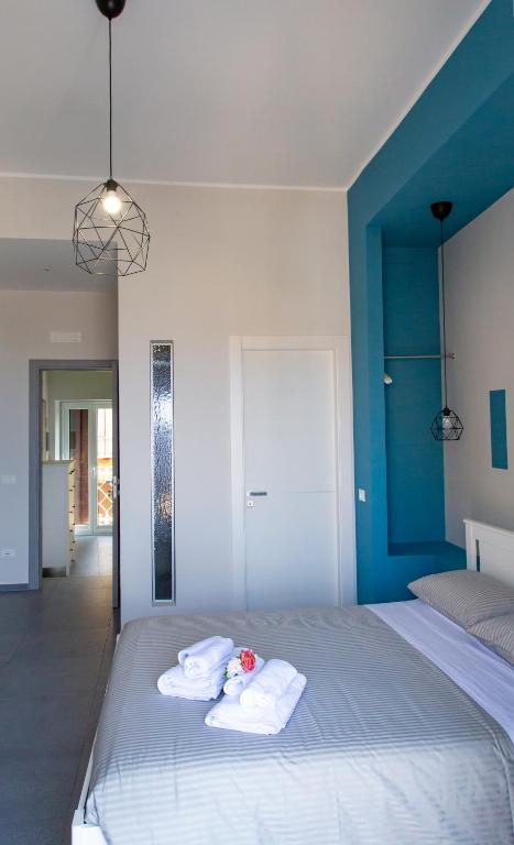 Postel nebo postele na pokoji v ubytování Guest House Nonnolorè