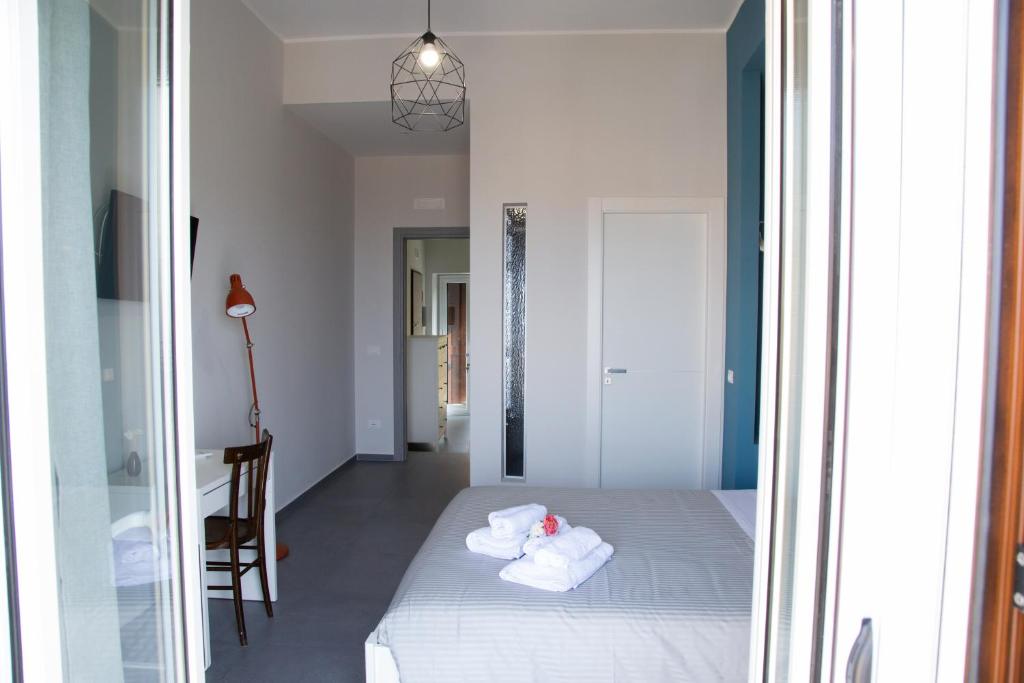 Postel nebo postele na pokoji v ubytování Guest House Nonnolorè