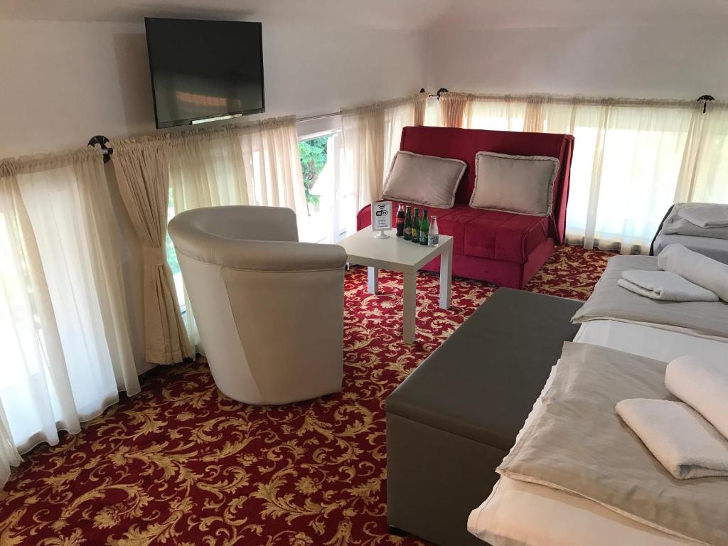 Postel nebo postele na pokoji v ubytování Residence Mahala