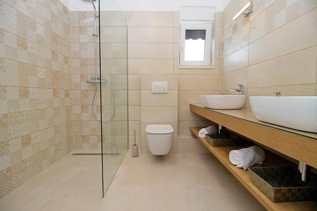 Koupelna v ubytování Villa Tela