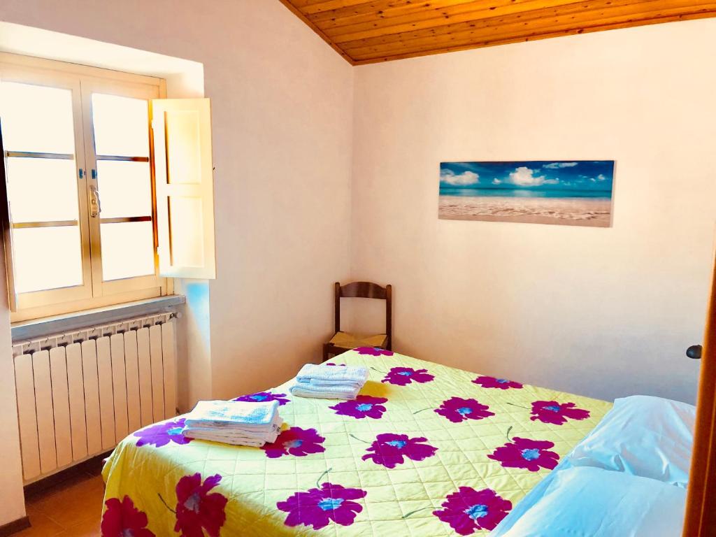 Postel nebo postele na pokoji v ubytování La vecchia canonica
