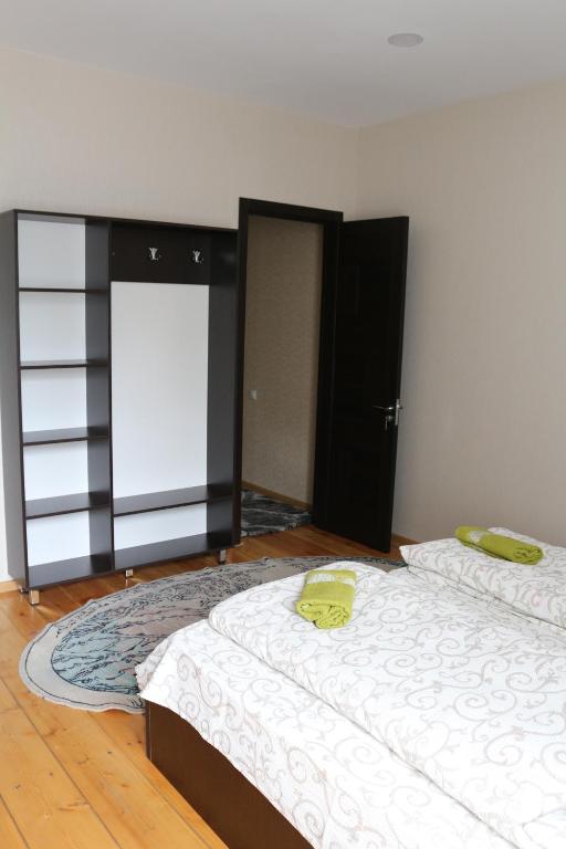 Postel nebo postele na pokoji v ubytování Guesthouse suja