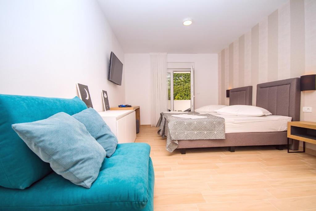 Postel nebo postele na pokoji v ubytování Villa Tela