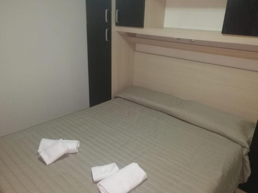 Postel nebo postele na pokoji v ubytování VILLAGGIO STAGNONE