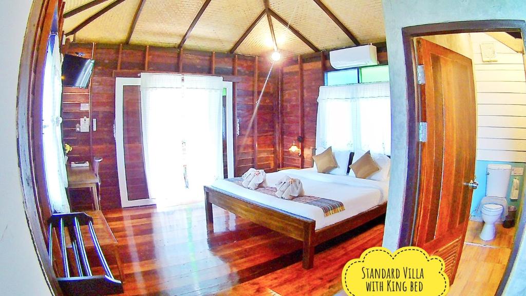 Postel nebo postele na pokoji v ubytování Mango House