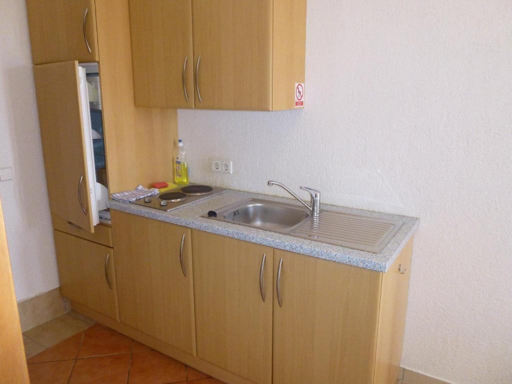 Kuchyň nebo kuchyňský kout v ubytování Apartments Villa Rosmarin