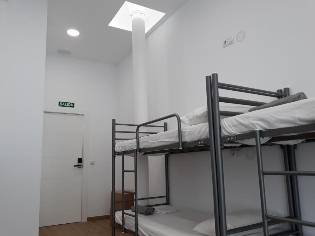 Postel nebo postele na pokoji v ubytování Hub Hostel Seville