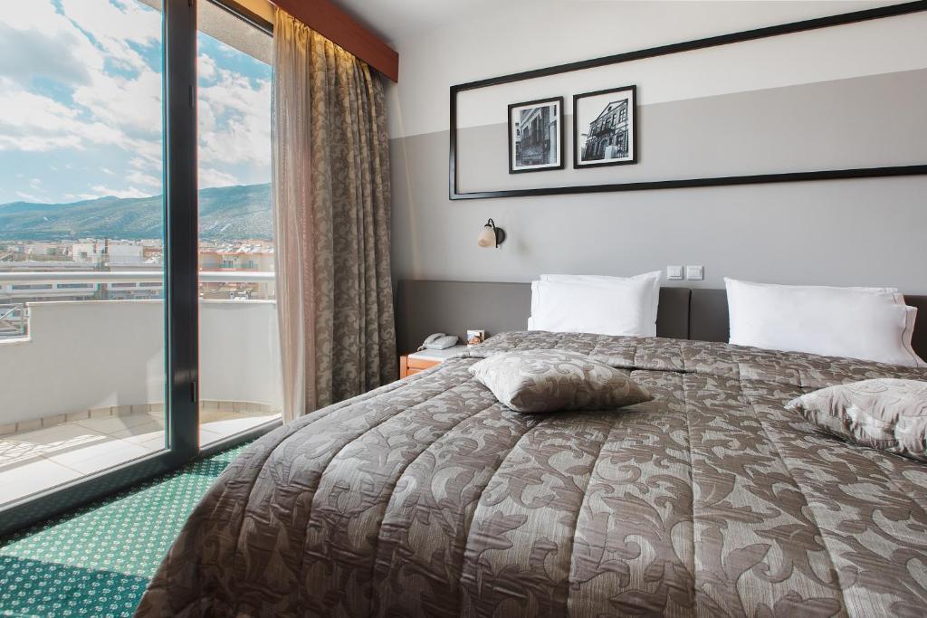 Ένα ή περισσότερα κρεβάτια σε δωμάτιο στο Hotel Z Palace & Congress Center