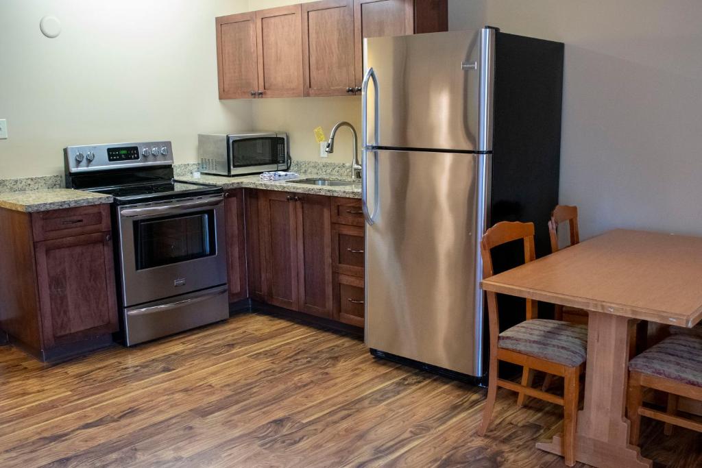 Kuchyň nebo kuchyňský kout v ubytování Aspen Village