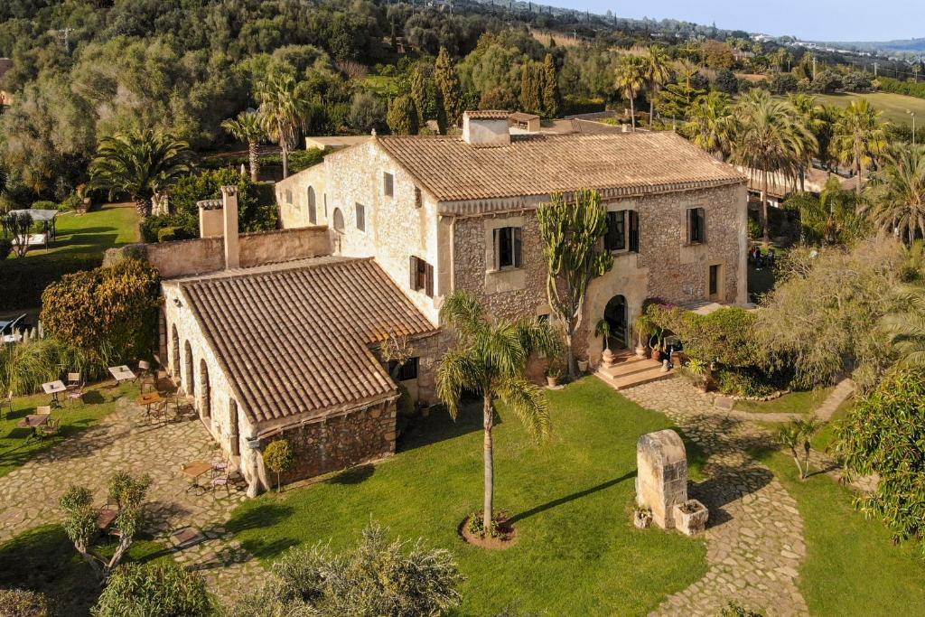 an aerial view of a house with a cemetery at La Reserva Rotana in Manacor