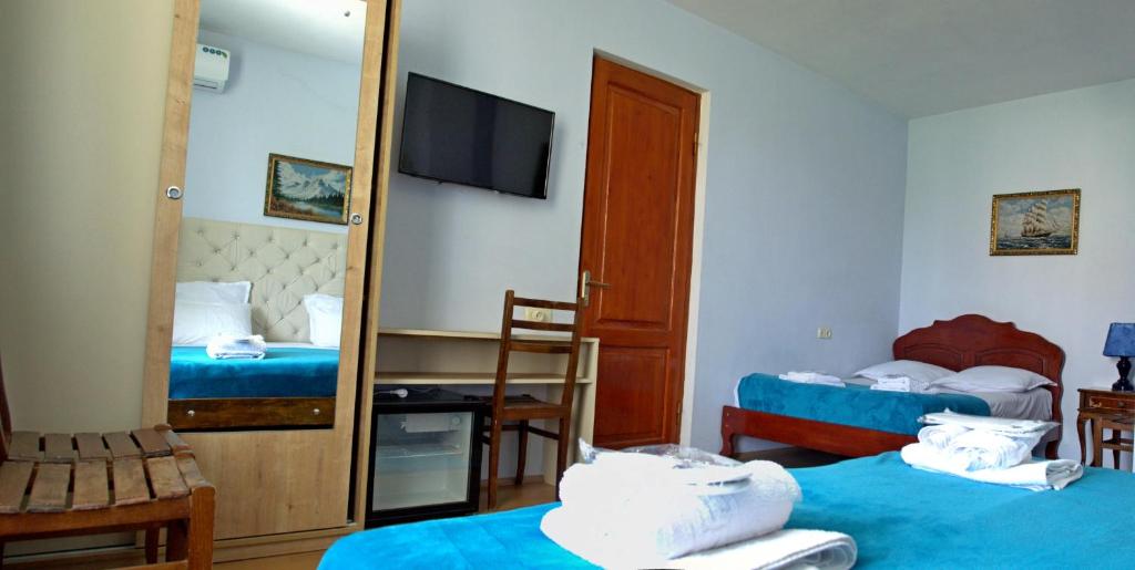 Postel nebo postele na pokoji v ubytování Boutique Hotel Eco-House Tbilisi
