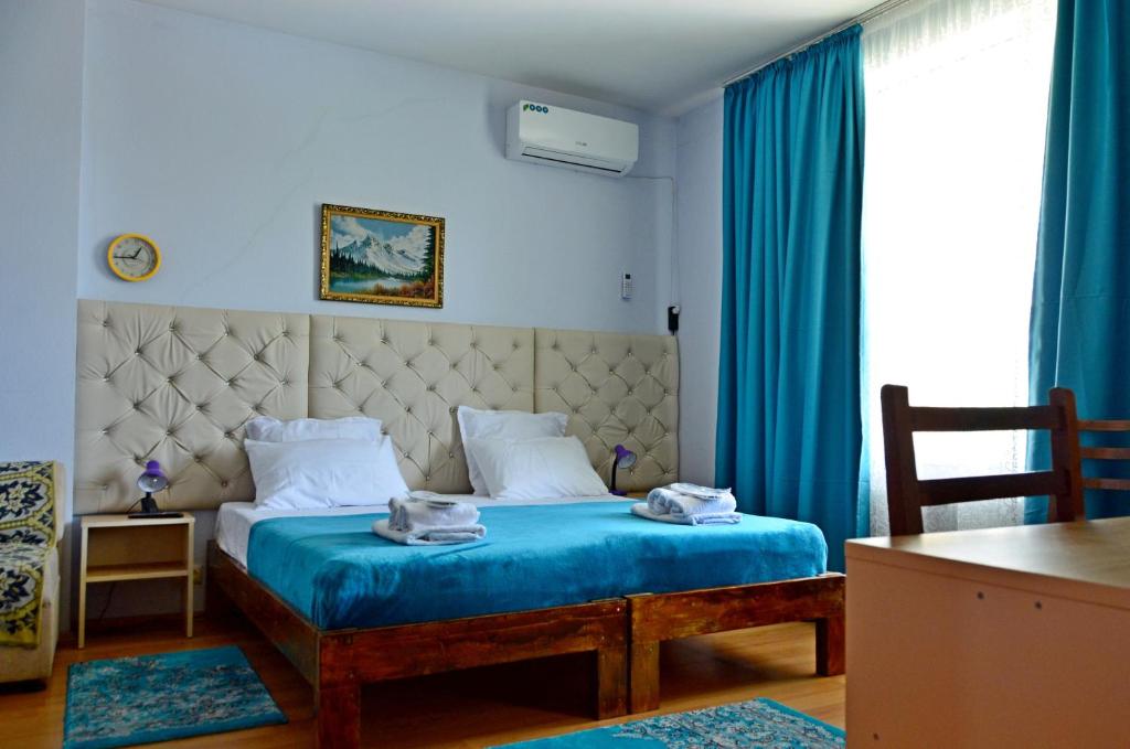 Postel nebo postele na pokoji v ubytování Boutique Hotel Eco-House Tbilisi