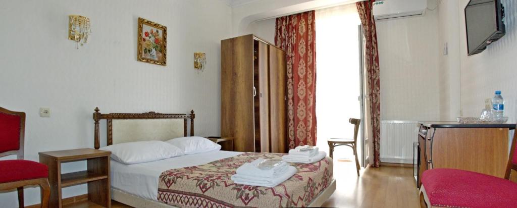 Postel nebo postele na pokoji v ubytování Boutique Hotel Eco-House Tbilisi