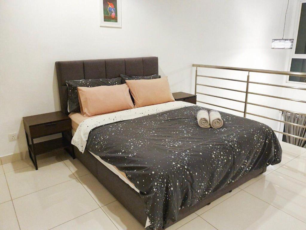 Postel nebo postele na pokoji v ubytování Yenni Duplex @ DeCentrum, Kajang