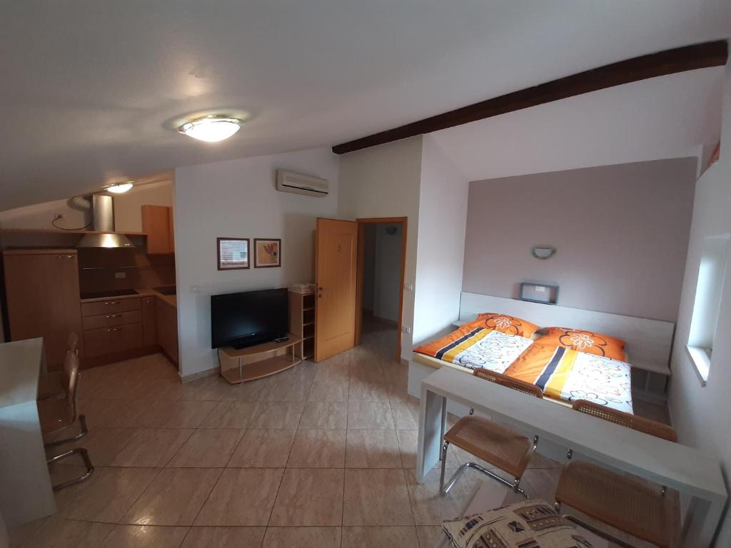 Postel nebo postele na pokoji v ubytování Apartma & RAfting