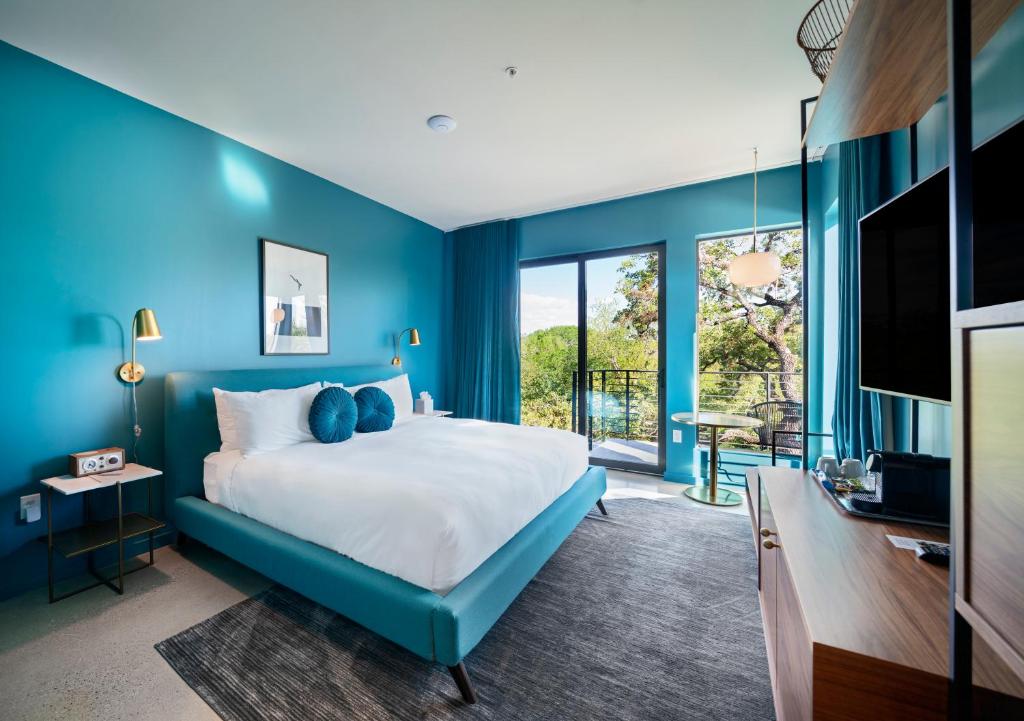 Letto o letti in una camera di The Ruby Hotel