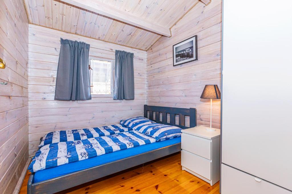 Postel nebo postele na pokoji v ubytování Domki DanTom