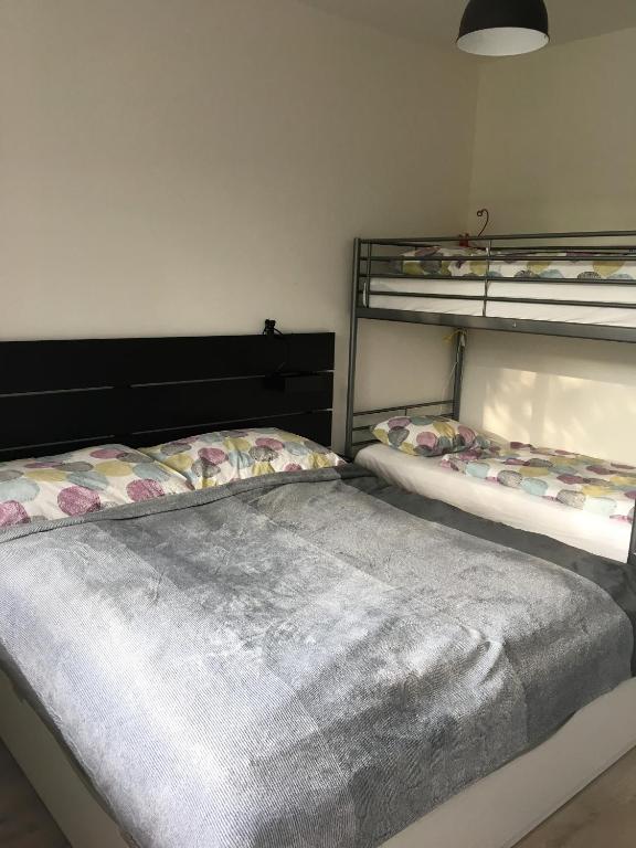 Postel nebo postele na pokoji v ubytování Apartmány 50