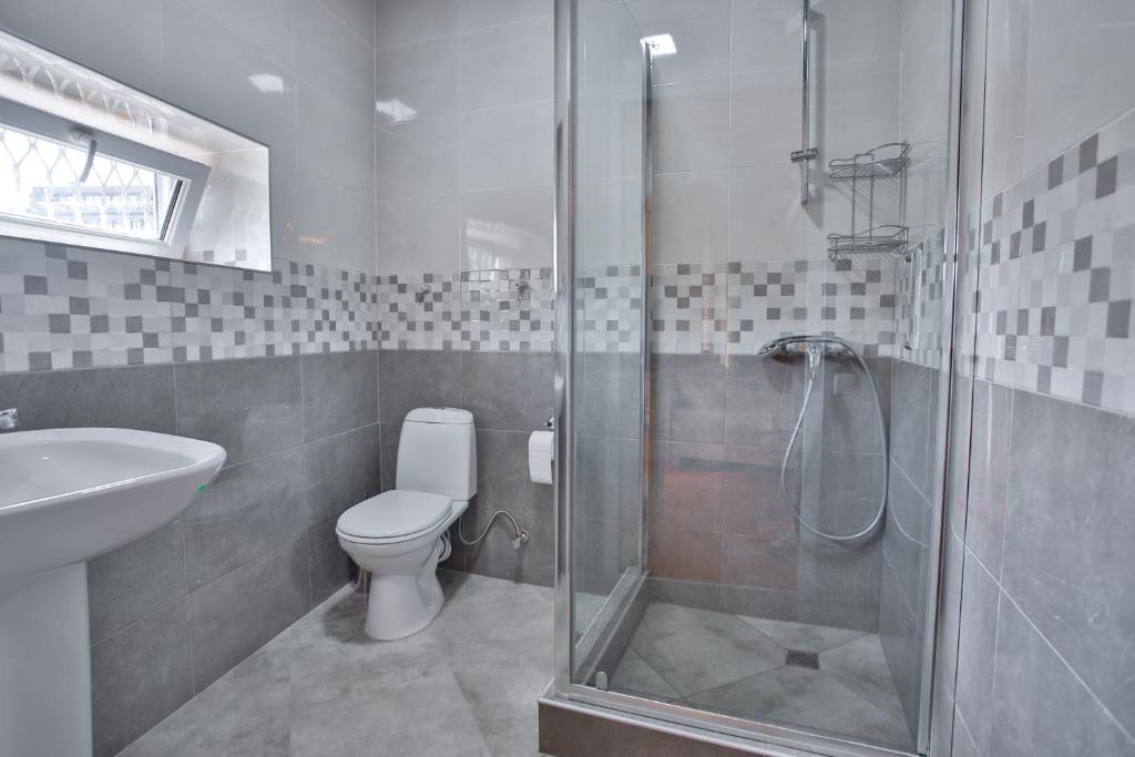 Koupelna v ubytování Pospolita Guest House
