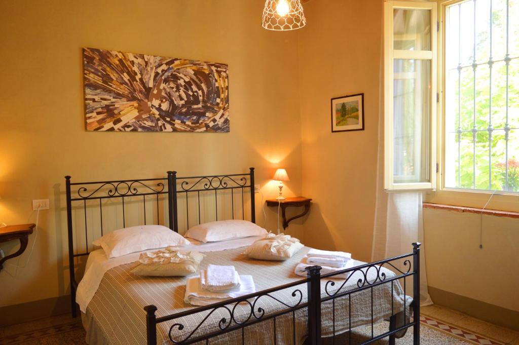 Posteľ alebo postele v izbe v ubytovaní Bed & Tours Dimora di campagna