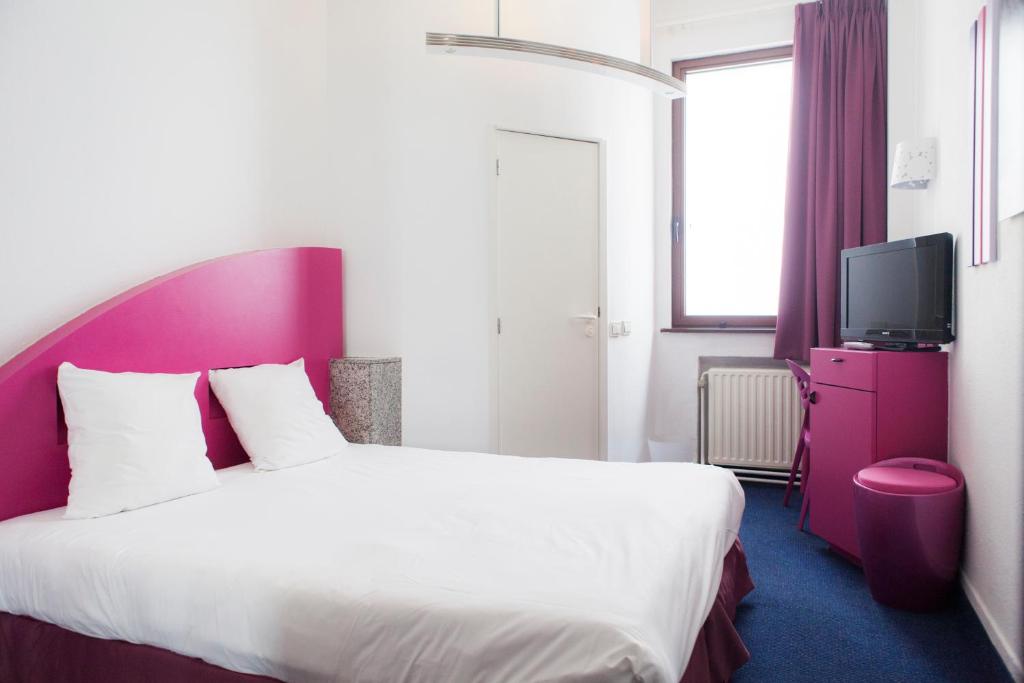 Postel nebo postele na pokoji v ubytování Hotel Siru Brussels