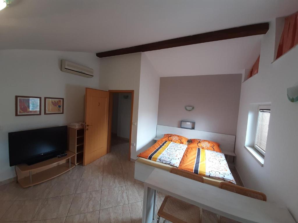 Postel nebo postele na pokoji v ubytování Apartma & RAfting