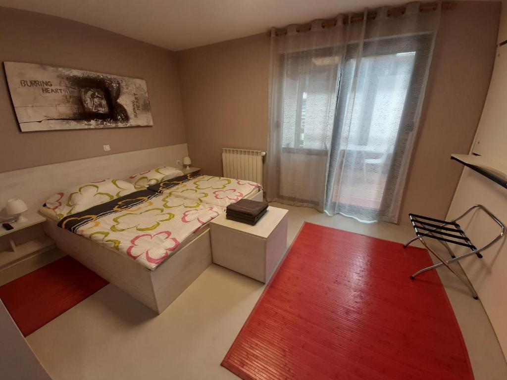 Postel nebo postele na pokoji v ubytování Apartma & RAfting