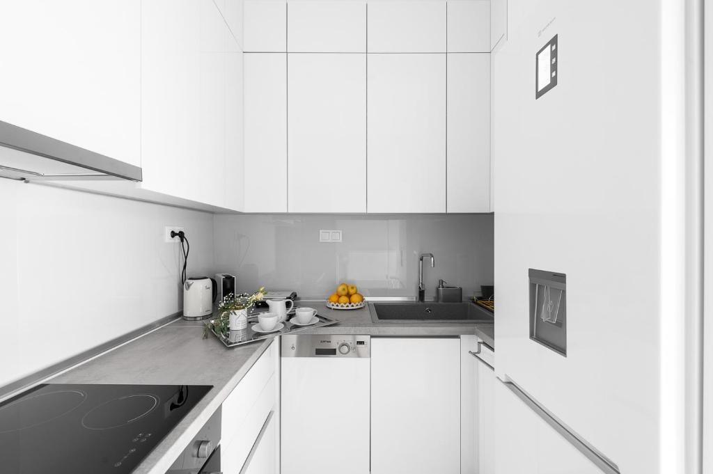 Kuchyňa alebo kuchynka v ubytovaní Maison Penthouse by Luxlikehome